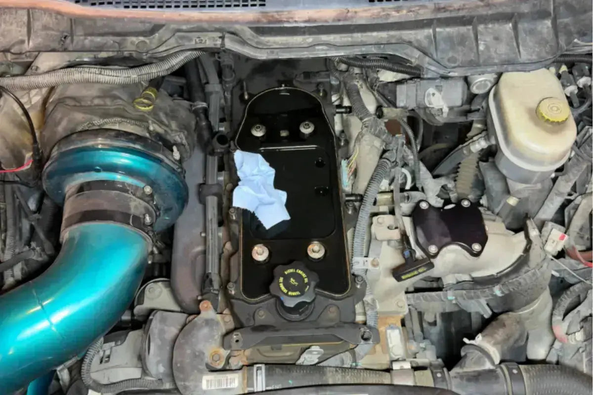 Why do I have to remove the stock ccv filter to replace the valve cover?