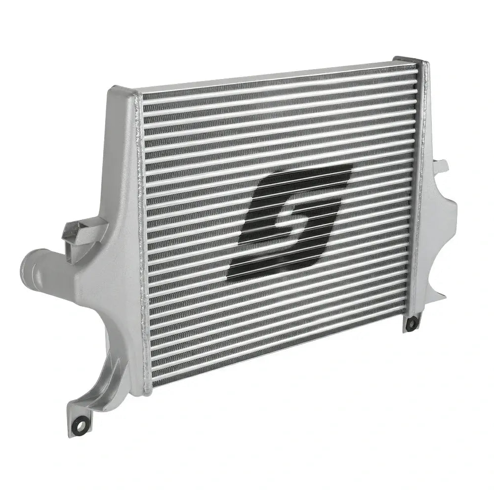 Angled view of a polished aluminum tube-fin intercooler with cast end tanks for a 2003-2007 Ford 6.0L Powerstroke