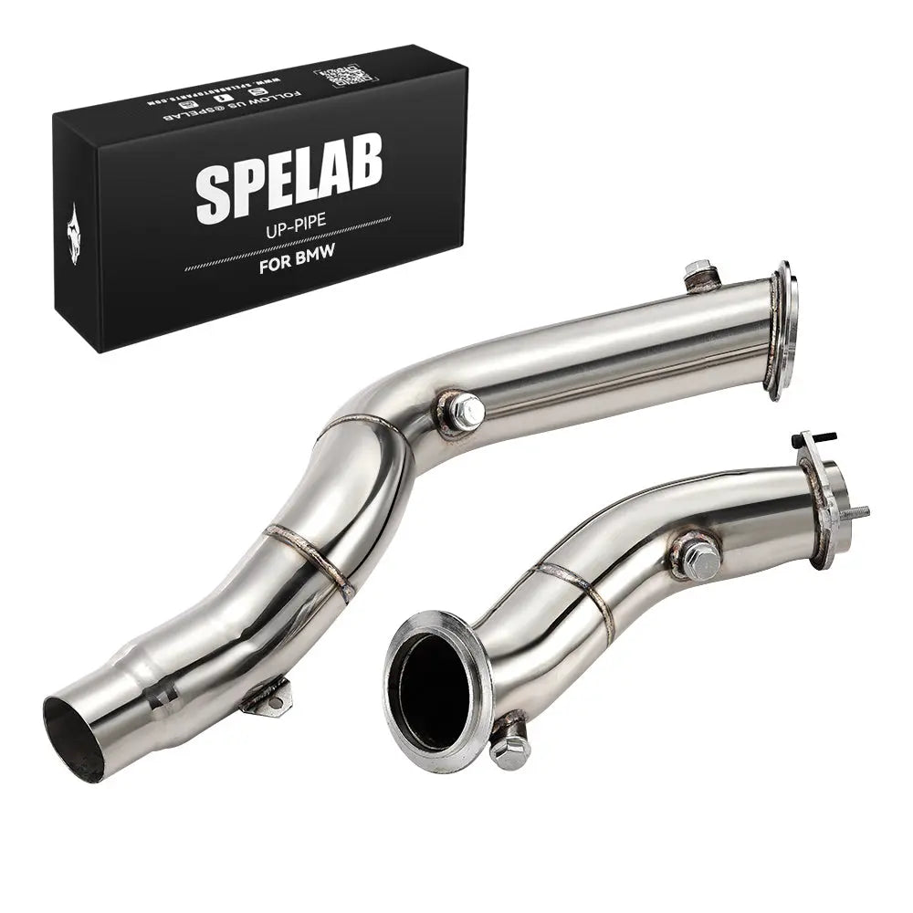 Pair of mirror-polished 3 inch catless downpipes for the S55 twin-turbo, shown with SPELAB packaging, a direct bolt-on V-band upgrade for 2015-2020 BMW M3 F80 and M4 F82.